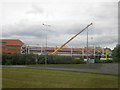 NT9954 : Steelwork being erected, Morrisons Berwick-upon-Tweed by Graham Robson