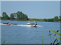 TL4384 : Speed boat on lake at Block Fen by Richard Humphrey