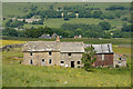 NY8737 : Deserted buildings at Hawkwell Head by Trevor Littlewood