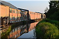 Industrial units alongside the River Wey Navigation seen from Tannery Bridge