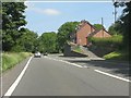 Elevated houses by the A49