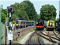 Two railways divided by a fence