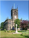 SJ9033 : Stone War Memorial and Parish Church by David Dixon
