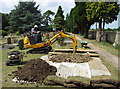 SU1590 : Digging a new grave at Blunsdon Cemetery by Gareth James