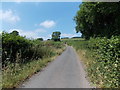 Lane between Llanogen Cottage and the village church, Llanstephan