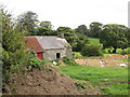 An old cottage on a site under going redevelopment