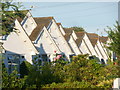 Charminster: bungalow frontages on Castle Lane