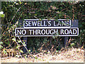 TG2700 : Sewell's Lane sign by Geographer