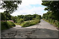 Baldingstone:  Sharp bend on a lane