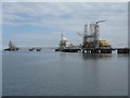 NT1580 : Oil tanker berths at Hound Point by M J Richardson