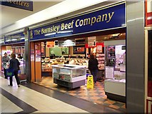 SE3406 : A butchers' shop in Barnsley market hall by Neil Theasby