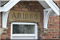 Date stone on the lock keeper