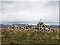 NO5476 : Summit cairn on Bulg by William Starkey