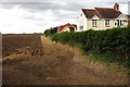 TL0442 : Houses on the northern edge of the village by Philip Jeffrey