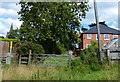 House and footpath on the edge of Fenny Drayton