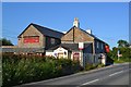 Side of the closed Forces Tavern by the A3122