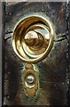 Old brass door furniture.