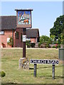 TG2902 : Yelverton Village sign by Geographer