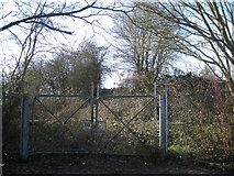 SP0366 : Gates into derelict land behind Evesham Road, Headless Cross, Redditch by Robin Stott