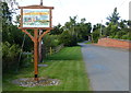 Village sign in Upton