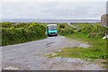 L8112 : Minibus approaching Na Seacht dTeampaill (Seven Churches), near Onaght, Inishmór (Árainn), Aran Islands, Co. Galway by P L Chadwick
