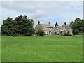 NY9393 : Elsdon village green by Mike Quinn