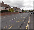 Faded bus stop markings, Badminton Grove, Ebbw Vale