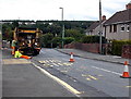 Repainting bus stop road markings in Badminton Grove, Ebbw Vale