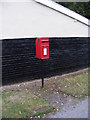 TM1384 : Mill Green Postbox by Geographer