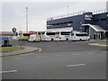 TA1328 : Coaches waiting at Terminal 1 by Ian S