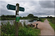 SX9687 : Teignbridge : The Exeter Canal & Signpost by Lewis Clarke