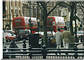 A pair of 94 Routemasters on Notting Hill Gate, 2002