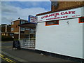 Looking past the Corner Cafe on the corner of Layton Road