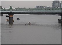 TQ2475 : Rowers under Fulham Railway Bridge by Bikeboy
