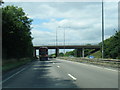 A180 westbound passes under Woad Lane