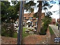 The Bell Inn through the trees