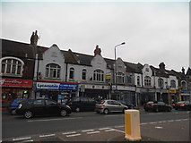 TQ3069 : Shops on Streatham High Road from Norbury Lane by David Howard
