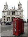 TQ3181 : City of London: red telephone boxes, St. Paul’s Churchyard by Chris Downer