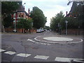 Mini roundabout at the junction of Exeter Road and Mapesbury Road