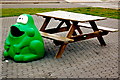 O0499 : Dundalk Applegreen Rest Stop - Frog and  Picnic Table by Joseph Mischyshyn