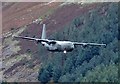 NT2421 : A Hercules flying by Bowerhope Law by Walter Baxter