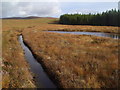 NC5521 : Pool and drainage channel on Cnoc na Doire near Crask Inn, Sutherland by ian shiell