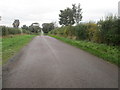 NT9145 : Minor road heading towards the A698 by James Denham