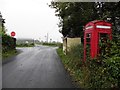 H3380 : Bus shelter and old telephone box, Drumlegagh by Kenneth  Allen