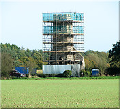 TG3413 : The tower of the ruined All Saints church under restoration by Evelyn Simak