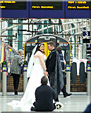 NS5865 : Bride & groom in Glasgow Central railway station by Thomas Nugent