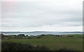 Fields with red barn above Cappelcarry Bay