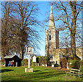 Village sign and church