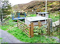 Enclosure with huts and footpath at Scout