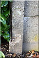 Benchmark on concrete post of Priory Road electricity substation